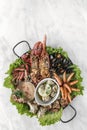 Mixed fresh seafood gourmet platter on spanish restaurant table