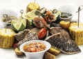 Mixed fried fish plate with seared seabass and red snapper Royalty Free Stock Photo