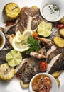 Mixed fried fish plate with seared seabass and red snapper Royalty Free Stock Photo