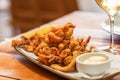 Mixed fried seafood with shrimp, squid and baby octopus and sauce mayonnaise fritto misto di mare, typical italian appetizer Royalty Free Stock Photo