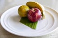 fruit plate on brown wooden table Royalty Free Stock Photo