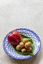 fruit plate on white stone table Royalty Free Stock Photo