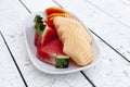 Fruit plate on white wood table Royalty Free Stock Photo
