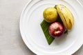 Fruit plate on white wood table Royalty Free Stock Photo