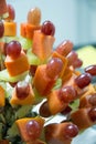 Mixed fruit skewer for chocolate fountain Royalty Free Stock Photo