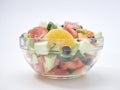 Mixed fruit and vegetable salad in a glass bowl Royalty Free Stock Photo