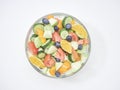 Mixed fruit and vegetable salad in a glass bowl Royalty Free Stock Photo