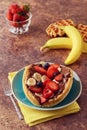 Mixed fruit waffle sandwich with chocolate spread