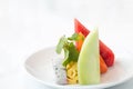 Mixed fruit on white plate. Royalty Free Stock Photo
