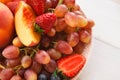 Mixed fruits and berries in glass bowls closeup, top view Royalty Free Stock Photo