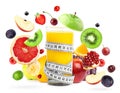 Mixed fruits falling and orange juice Royalty Free Stock Photo