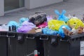Mixed garbage in large quantities in the construction container. Sorting, Zero waste. second hand space. Recycling mixed