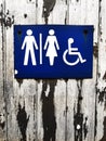 Mixed gender and disability public toilet sign