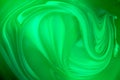 Mixed green oil paint swirl