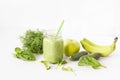 Mixed green smoothie with ingredients Royalty Free Stock Photo