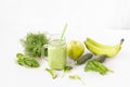 Mixed green smoothie with ingredients Royalty Free Stock Photo