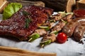 Mixed grilled meat platter. Assorted delicious grilled meat with vegetable. Royalty Free Stock Photo