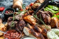 Mixed grilled meat platter. Barbecue menu. Grilled meat and vegetables. Food recipe background. Close up Royalty Free Stock Photo