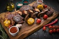 Mixed grilled meat platter on a black background Royalty Free Stock Photo