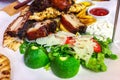 Mixed grilled meat platter. Royalty Free Stock Photo