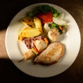 Mixed Grilled meat and vegetables decorated on a plate ready to be served in restaurant Royalty Free Stock Photo