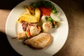 Mixed Grilled meat and vegetables decorated on a plate ready to be served in restaurant Royalty Free Stock Photo