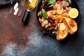 Mixed grilled seafood and white wine Royalty Free Stock Photo