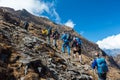 Mixed Group of Athletes ascending Mountain