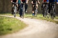 Mixed group of cyclists biking