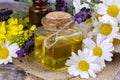 Mixed herbal oil. Essential oil various. Colorful flowers