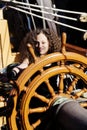 Mixed Heritage Woman Standing At Steering Wheel Tall Ship Royalty Free Stock Photo