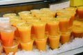 Mixed ice orange cold juice bottle or glass in the market Royalty Free Stock Photo