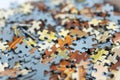 Mixed jigsaw puzzle pieces background, macro close up Royalty Free Stock Photo