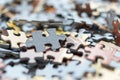 Mixed jigsaw puzzle pieces background, macro close up Royalty Free Stock Photo