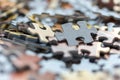 Mixed jigsaw puzzle pieces background, macro close up Royalty Free Stock Photo