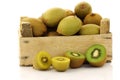 Mixed kiwi fruit in a wooden crate Royalty Free Stock Photo