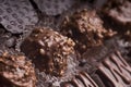 Mixed luxury dark and milk chocolate truffles. Assorted delicious handmade chocolate pralines in a row. Full frame background. Royalty Free Stock Photo