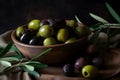 Mixed marinated green, black and purpleolives in a ceramic bowl and basil leaves, generative AI. Royalty Free Stock Photo