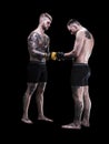 Mixed martial artists before a fight on black background Royalty Free Stock Photo