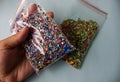 Mixed multi-colored diamonds mosaic. two bags with beads Royalty Free Stock Photo