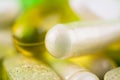 Mixed natural food supplement pills, omega 3, multivitamin and glucosamine capsules, macro image. Royalty Free Stock Photo