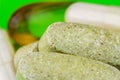 Mixed natural food supplement pills, omega 3, multivitamin and glucosamine capsules, macro image. Royalty Free Stock Photo