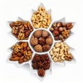 Mixed Nuts Arrangement in White Maple Leaf Bowl on White Background Royalty Free Stock Photo