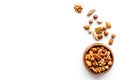 Mixed nuts in bowl - healthy snack - on white background top-down frame copy space Royalty Free Stock Photo