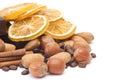 Mixed nuts, cinnamon, coffee beans and oranges Royalty Free Stock Photo