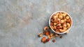 Mixed nuts and dried fruits on a gray background. Top view, copy space. Royalty Free Stock Photo