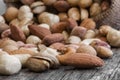 Mixed Nuts, dried fruits on wooden table, different kind of healthy food Royalty Free Stock Photo