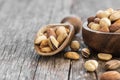 Mixed Nuts, dried fruits on wooden table, different kind of healthy food Royalty Free Stock Photo