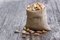 Mixed Nuts, dried fruits on wooden table, different kind of healthy food Royalty Free Stock Photo