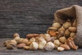 Mixed Nuts, dried fruits on wooden table, different kind of healthy food Royalty Free Stock Photo